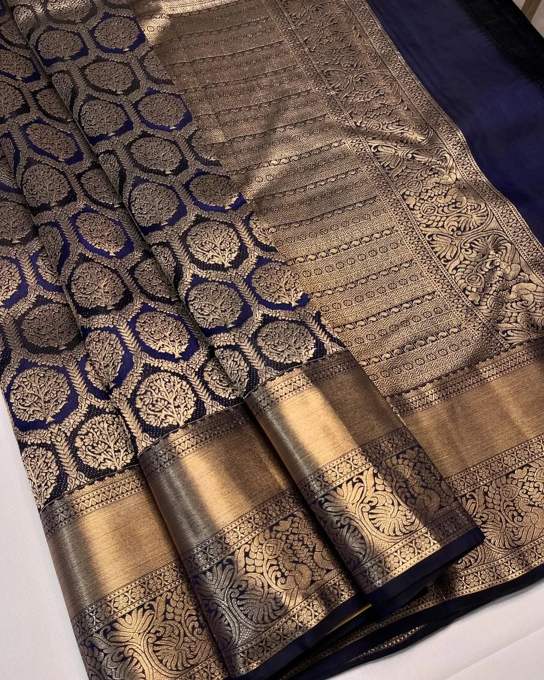 Lustrous Navy Blue Soft Banarasi Silk Saree With Seraphic Blouse Piece
