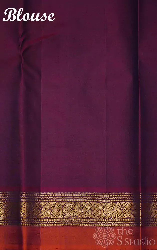 Rama blue kanchi silk saree with vertical thread lines and purple pallu