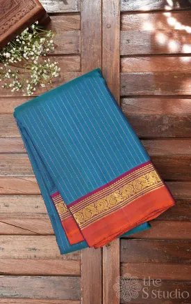 Rama blue kanchi silk saree with vertical thread lines and purple pallu