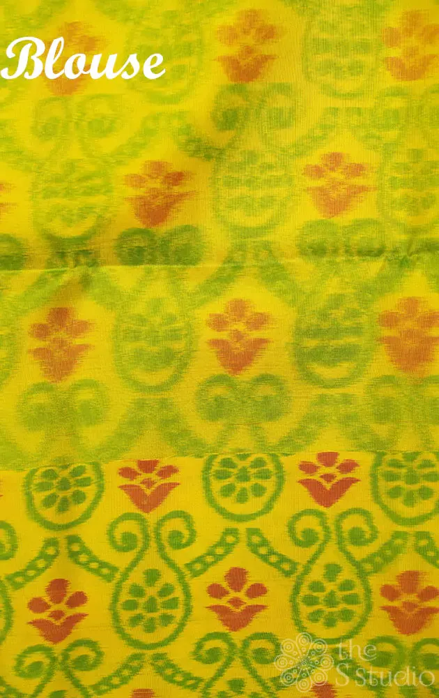 Reddish peach soft silk saree with lime green ikat woven border